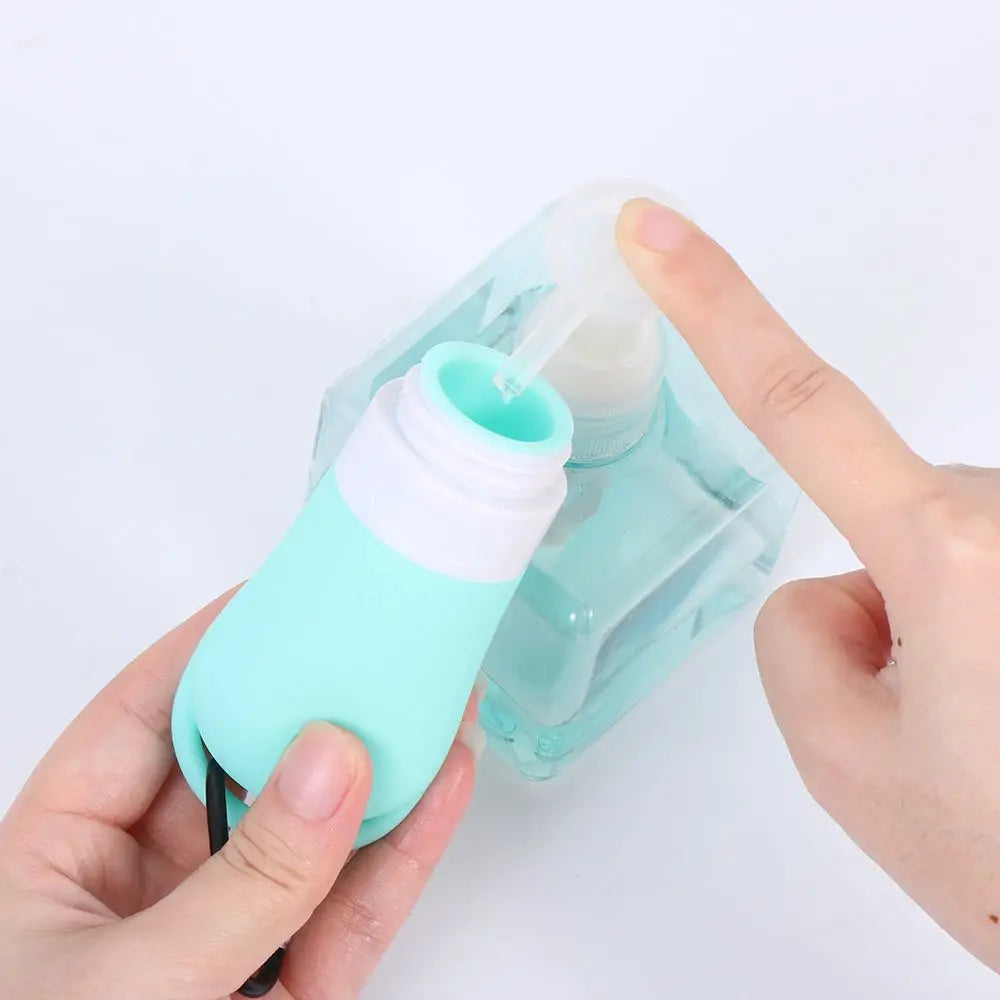 Travel Bottle Leakproof Silicone Refillable Squeezable Travel Tube with Keychain Hook for Cosmetic Toiletry Shampoo