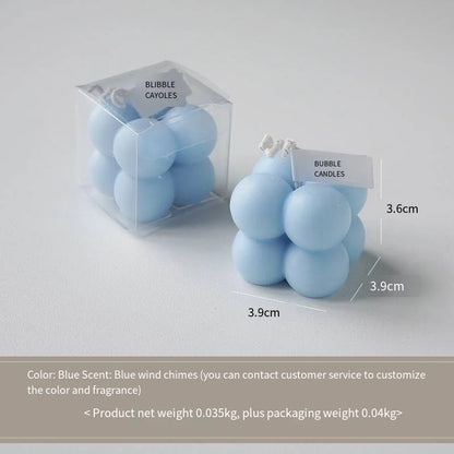 A square ball-shaped scented candle, a colorful birthday gift, a handcrafted candle, and a cute-shaped scented candle