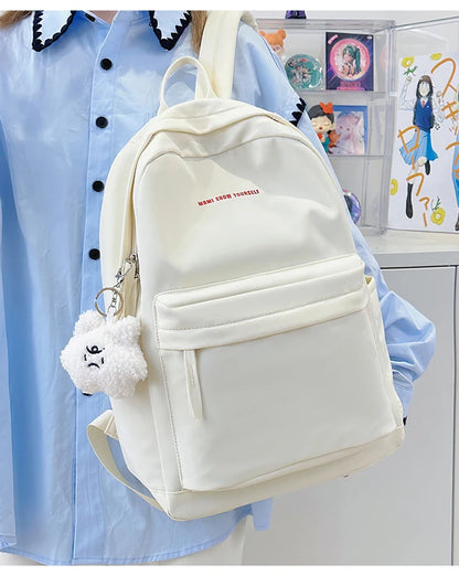 Schoolbags for junior high school girls. They are large-capacity, simple, versatile solid-color double-shoulder bags in ins styl
