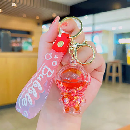 Cute Astronaut Keychain Space Capsule Lava Lamp Oil Filling Bear Key Chain Gift Pendant for Couples Bag Charm Accessories