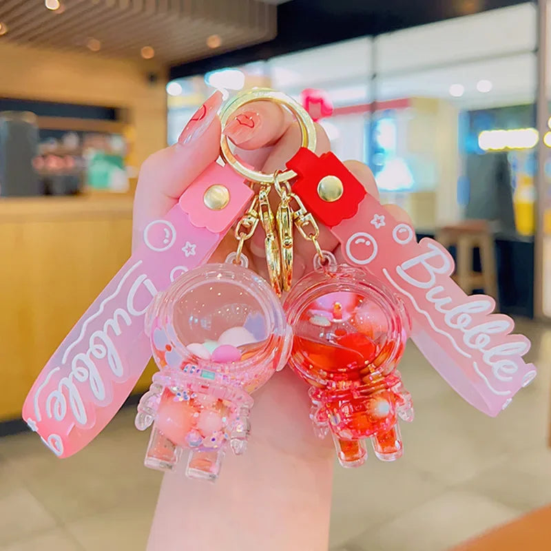 Cute Astronaut Keychain Space Capsule Lava Lamp Oil Filling Bear Key Chain Gift Pendant for Couples Bag Charm Accessories