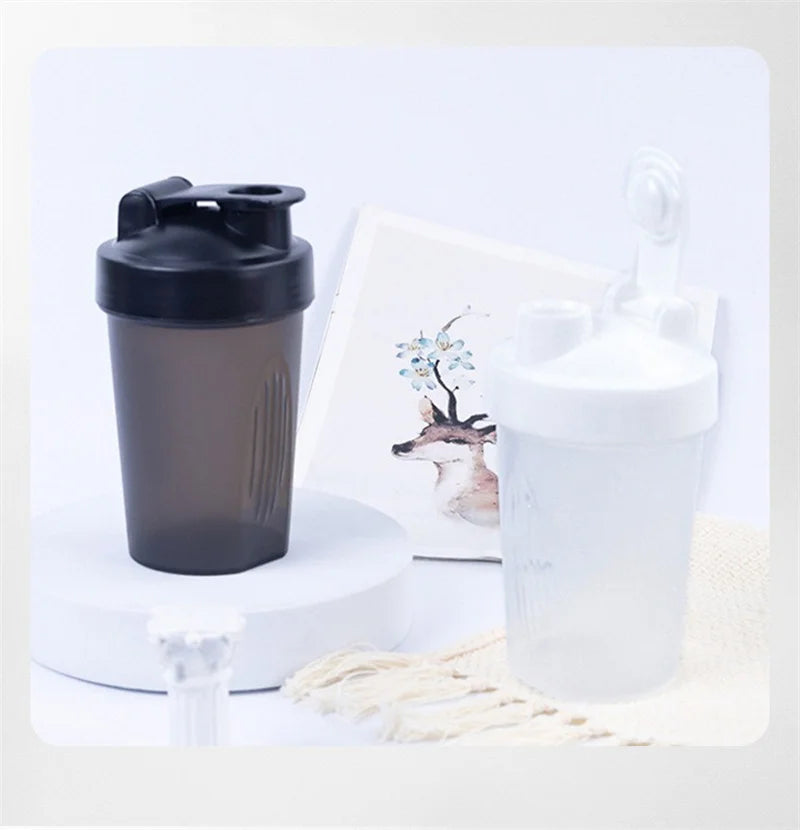 Sports water cup with Shaker Balls Leak Proof Drink Shaker Bottle Whey Protein Powder Mixing Bottle Fitness Gym Shaker Drink Cup