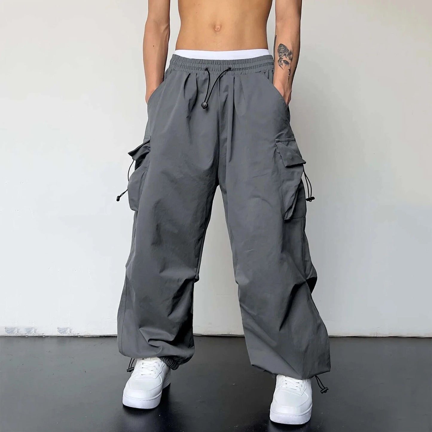Mens Casual Sports Cargo Pants Woven Pocket Foot Rope Street Tie Solid Pants Mens Multi-Pockets Cargo Pants Pantalones Hombre