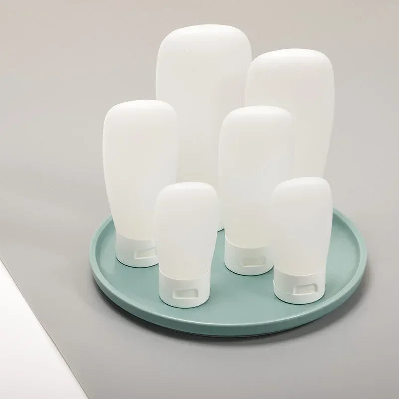 4-Piece Silicone Leak-Proof Travel Bottle Set Portable Refillable Squeezable Containers for Toiletries Lotion Business Trip