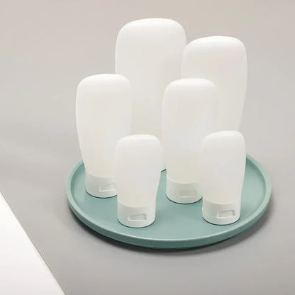 4-Piece Silicone Leak-Proof Travel Bottle Set Portable Refillable Squeezable Containers for Toiletries Lotion Business Trip