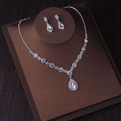 Fashionable bridal accessory set consisting of a necklace and a pair of earrings. New wedding dress, dress accessories, wedding