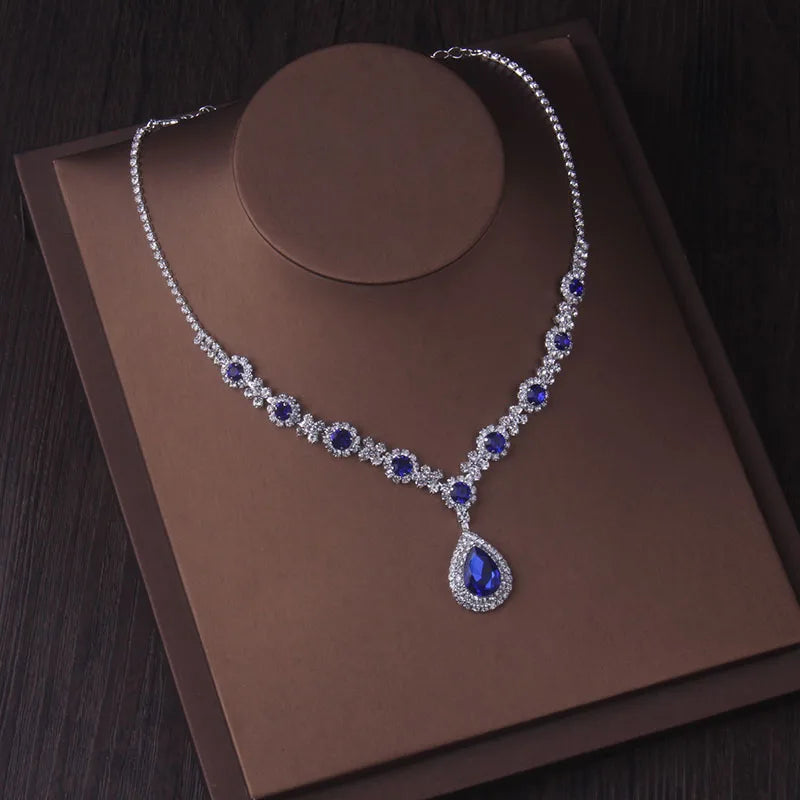 Fashionable bridal accessory set consisting of a necklace and a pair of earrings. New wedding dress, dress accessories, wedding