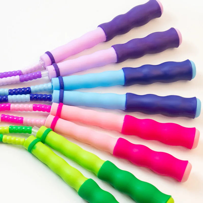 Wholesale adult and children's skipping ropes with colorful soft beads and bamboo nodes. Children's skipping ropes