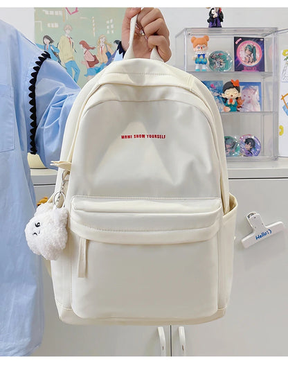 Schoolbags for junior high school girls. They are large-capacity, simple, versatile solid-color double-shoulder bags in ins styl