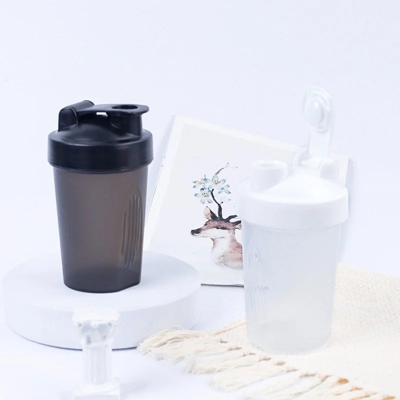 Sports water cup with Shaker Balls Leak Proof Drink Shaker Bottle Whey Protein Powder Mixing Bottle Fitness Gym Shaker Drink Cup