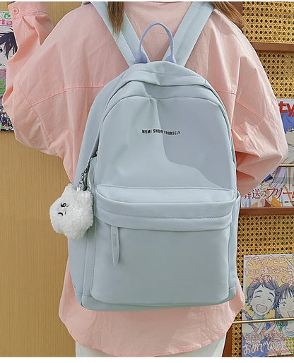Schoolbags for junior high school girls. They are large-capacity, simple, versatile solid-color double-shoulder bags in ins styl