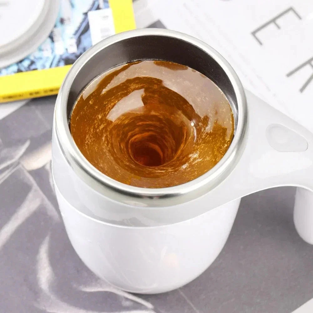 Self mixing mug: a self mixing coffee cup, a rotating home office travel mixing cup, used for mixing coffee, chocolate, etc