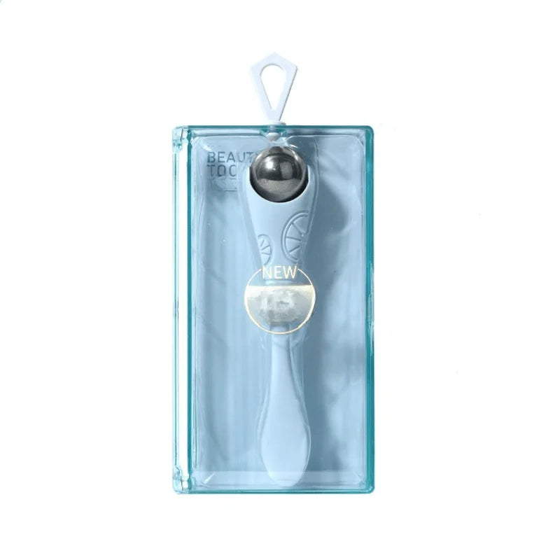 A double-ended manual eye massage roller with a gentle roll-on design for delicate eye treatments