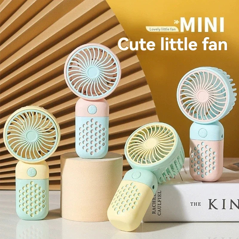 2025 New Handheld Charging Fan Cartoon Cute Small Student Charging Small Fan Portable Mini USB Fan Mini Pocket fans