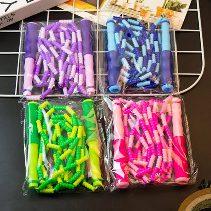 Wholesale adult and children's skipping ropes with colorful soft beads and bamboo nodes. Children's skipping ropes
