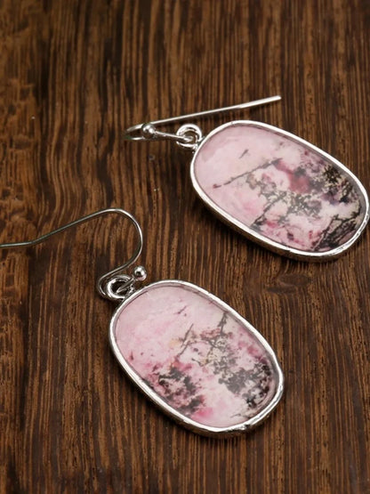 Bohemian earrings with pink gemstones are used as wedding or holiday gifts