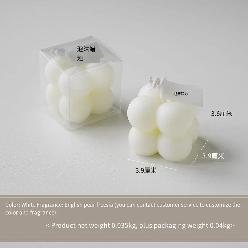 A square ball-shaped scented candle, a colorful birthday gift, a handcrafted candle, and a cute-shaped scented candle