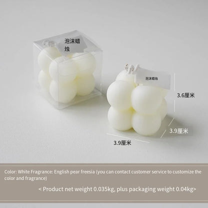 A square ball-shaped scented candle, a colorful birthday gift, a handcrafted candle, and a cute-shaped scented candle