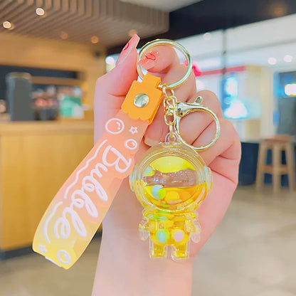 Cute Astronaut Keychain Space Capsule Lava Lamp Oil Filling Bear Key Chain Gift Pendant for Couples Bag Charm Accessories