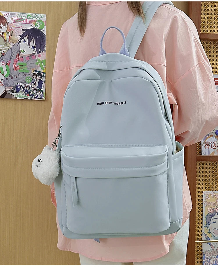 Schoolbags for junior high school girls. They are large-capacity, simple, versatile solid-color double-shoulder bags in ins styl