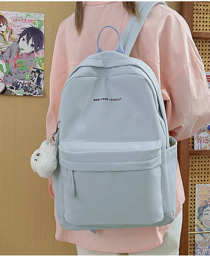 Schoolbags for junior high school girls. They are large-capacity, simple, versatile solid-color double-shoulder bags in ins styl