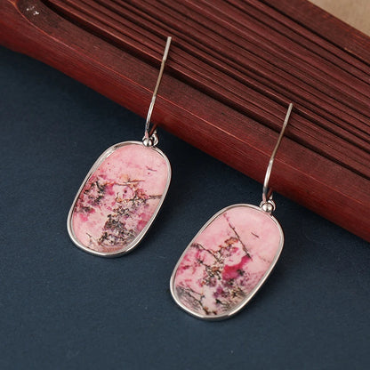 Bohemian earrings with pink gemstones are used as wedding or holiday gifts