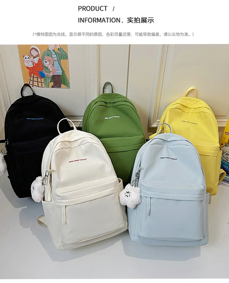 Schoolbags for junior high school girls. They are large-capacity, simple, versatile solid-color double-shoulder bags in ins styl