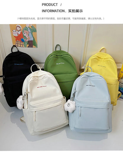 Schoolbags for junior high school girls. They are large-capacity, simple, versatile solid-color double-shoulder bags in ins styl