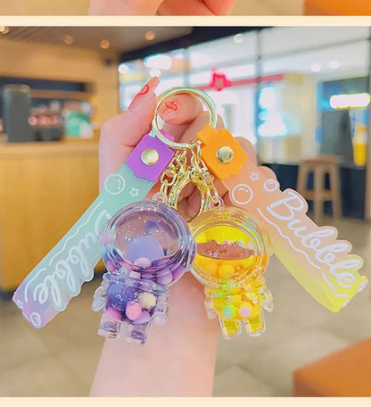 Cute Astronaut Keychain Space Capsule Lava Lamp Oil Filling Bear Key Chain Gift Pendant for Couples Bag Charm Accessories