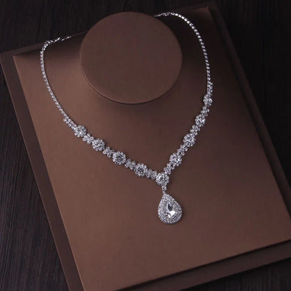 Fashionable bridal accessory set consisting of a necklace and a pair of earrings. New wedding dress, dress accessories, wedding