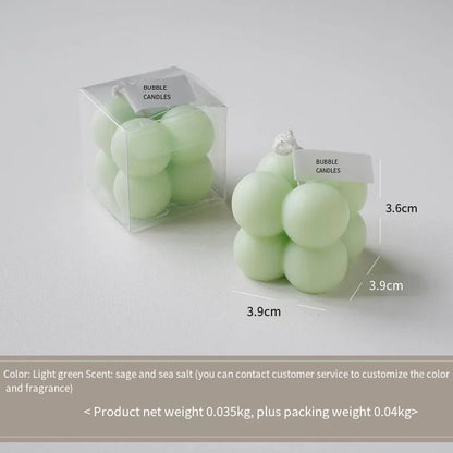 A square ball-shaped scented candle, a colorful birthday gift, a handcrafted candle, and a cute-shaped scented candle