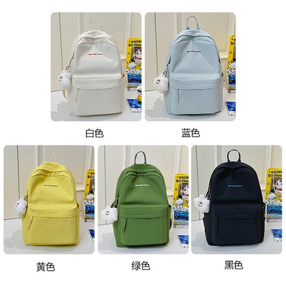 Schoolbags for junior high school girls. They are large-capacity, simple, versatile solid-color double-shoulder bags in ins styl