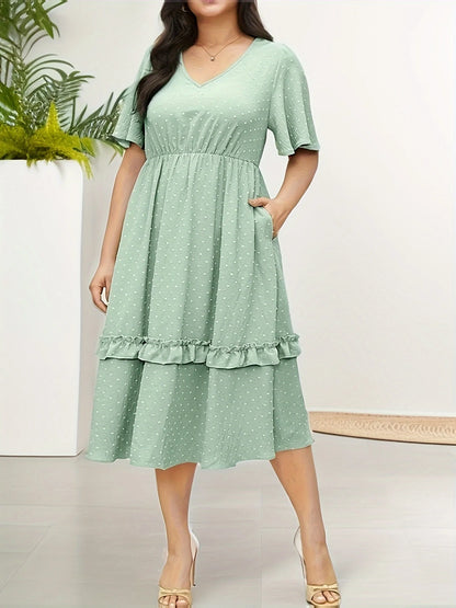 Plus-size spring/summer office commute Wear an elegant dress with pockets and a mint green color that looks cool and comfortable
