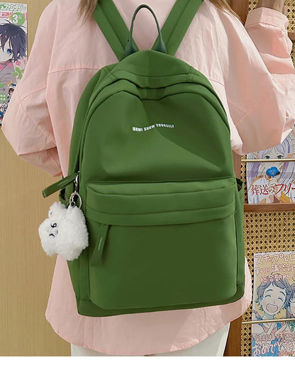 Schoolbags for junior high school girls. They are large-capacity, simple, versatile solid-color double-shoulder bags in ins styl