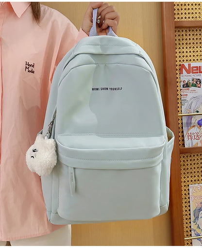 Schoolbags for junior high school girls. They are large-capacity, simple, versatile solid-color double-shoulder bags in ins styl