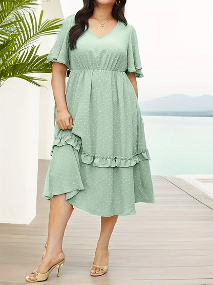 Plus-size spring/summer office commute Wear an elegant dress with pockets and a mint green color that looks cool and comfortable