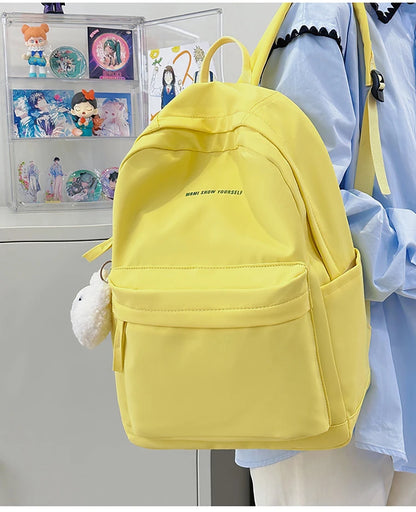 Schoolbags for junior high school girls. They are large-capacity, simple, versatile solid-color double-shoulder bags in ins styl