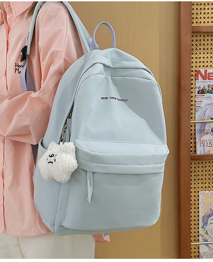 Schoolbags for junior high school girls. They are large-capacity, simple, versatile solid-color double-shoulder bags in ins styl