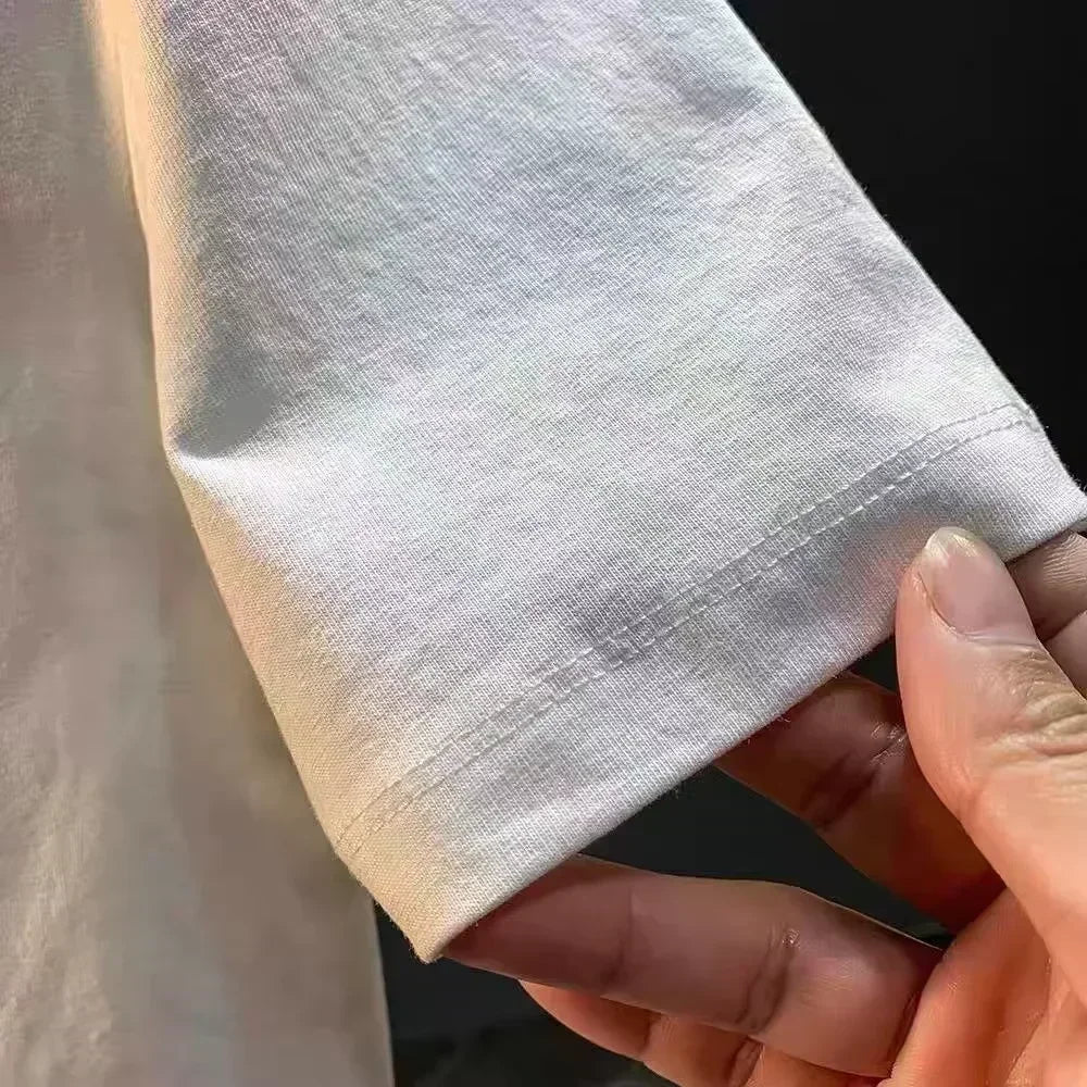 The New Designs of Short-sleeved T-shirts for Both Men and Women in The Summer of 2025 Are Trendy, Fashionable, Laid-back