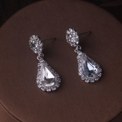 Fashionable bridal accessory set consisting of a necklace and a pair of earrings. New wedding dress, dress accessories, wedding