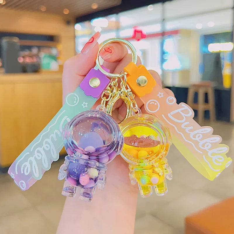 Cute Astronaut Keychain Space Capsule Lava Lamp Oil Filling Bear Key Chain Gift Pendant for Couples Bag Charm Accessories