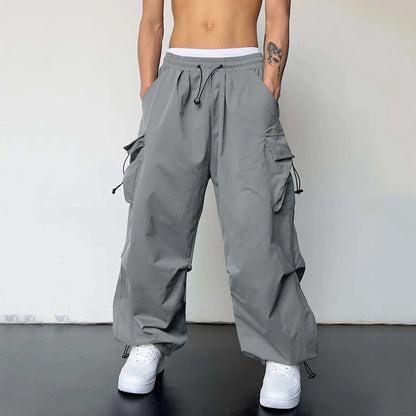Mens Casual Sports Cargo Pants Woven Pocket Foot Rope Street Tie Solid Pants Mens Multi-Pockets Cargo Pants Pantalones Hombre