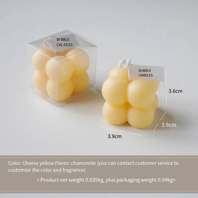 A square ball-shaped scented candle, a colorful birthday gift, a handcrafted candle, and a cute-shaped scented candle