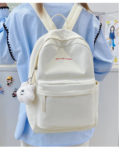 Schoolbags for junior high school girls. They are large-capacity, simple, versatile solid-color double-shoulder bags in ins styl