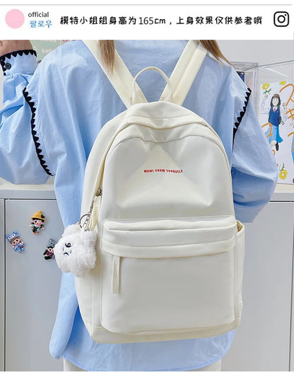 Schoolbags for junior high school girls. They are large-capacity, simple, versatile solid-color double-shoulder bags in ins styl