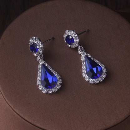 Fashionable bridal accessory set consisting of a necklace and a pair of earrings. New wedding dress, dress accessories, wedding