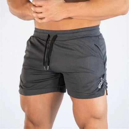 2024 New Fitness Big Muscle Man Fitness Slim Shorts Run And Train On The Beach With Pull Rope And Three Point Fitness Shorts
