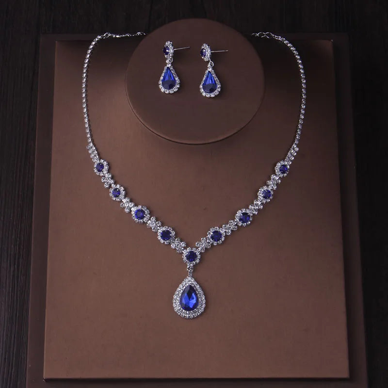 Fashionable bridal accessory set consisting of a necklace and a pair of earrings. New wedding dress, dress accessories, wedding